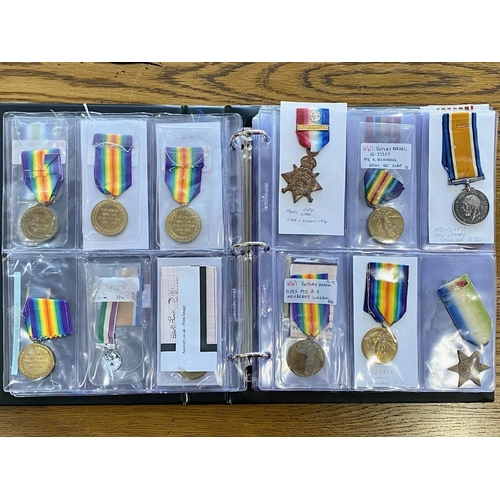 1304 - Medal Album Containing a Collection of 54 Military Medals, mostly singles, to include WWII Stars, WW... 