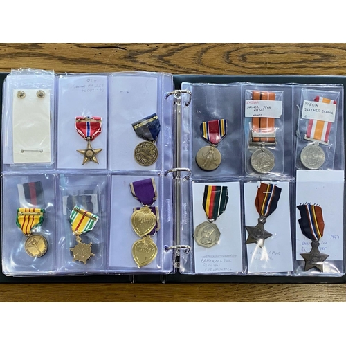 1304 - Medal Album Containing a Collection of 54 Military Medals, mostly singles, to include WWII Stars, WW... 