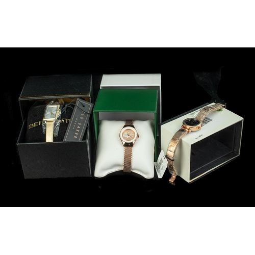 394 - Collection of Ladies Designer Watches. ( 3 ) In Total. Comprises 1/ Ted Baker, Gold Metallic Strap, ... 