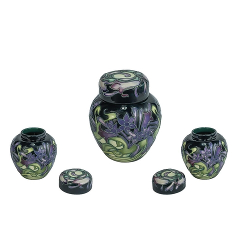 571 - Moorcroft Modern Small Lidded Tube lined Jar, Styalished Floral Design, Date 2003. Height 4.25 Inche... 