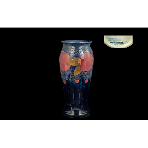 664 - Moorcroft Blue Pomegranate Tall Vase. Full Stamps to Base. Height Approx 10.5 Inches Tall.