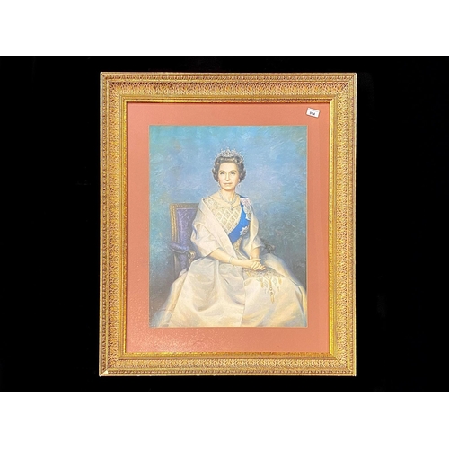 914 - Large Framed Print of Her Majesty Queen Elizabeth II, mounted framed and glazed in a gilt surround. ... 