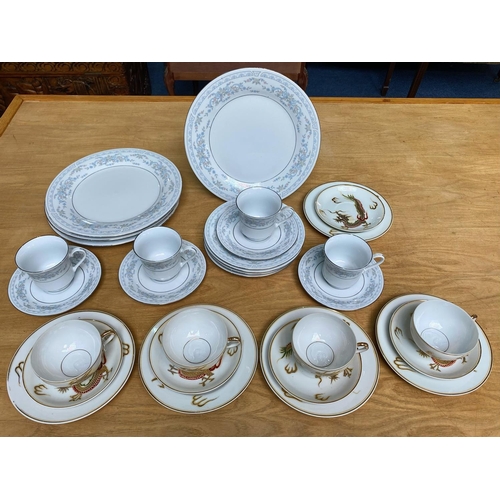 713 - Crown Ming Fine China Set, comprising four cups, saucers, sides and dinner plates.  Together with an... 