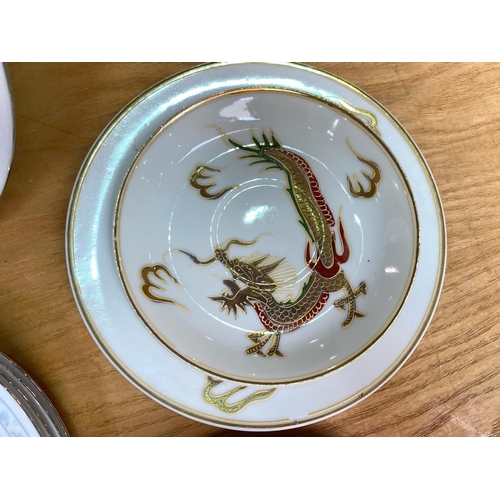 713 - Crown Ming Fine China Set, comprising four cups, saucers, sides and dinner plates.  Together with an... 