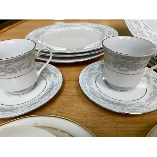 713 - Crown Ming Fine China Set, comprising four cups, saucers, sides and dinner plates.  Together with an... 