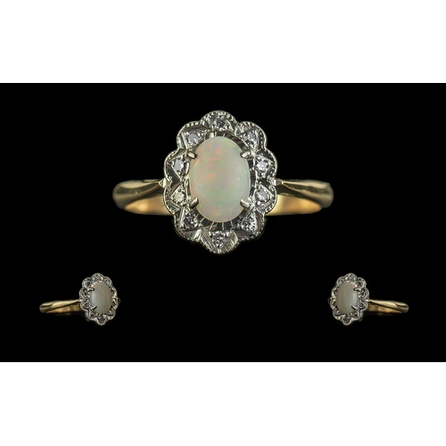 77B - 18ct Ladies Opal and Diamond Ring. An Opal Ring Surrounded by Diamonds In 18ct and Platinum. Antique... 