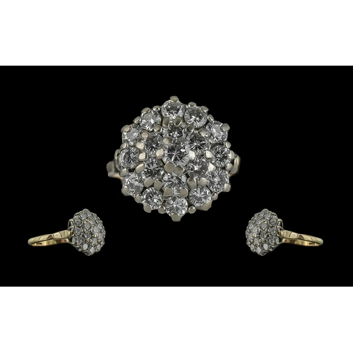 84 - 18ct Gold and Platinum Diamond Set Cluster Ring. Marked 18ct to Interior of Shank. Flower head Setti... 
