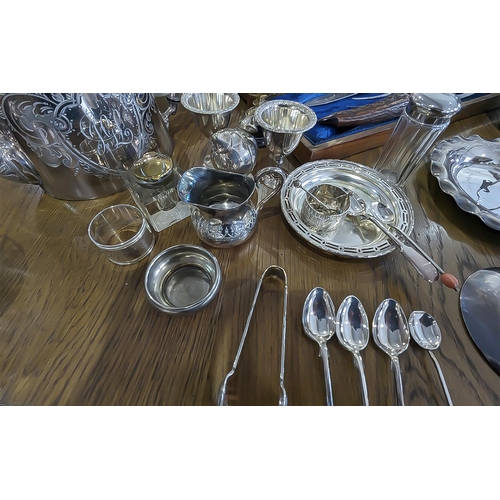 1255 - Collection of Silver Plated Ware, comprising teapots, vases,  cups, serving knives and forks, etc.