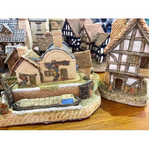 1357 - Large Collection of Lilliput Lane Cottages, churches, pubs, etc.  All unboxed.  Approx. 25, idea for... 