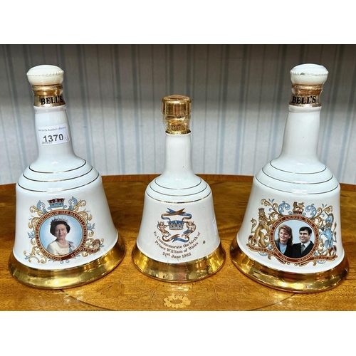 1370 - Three Bell's Scotch Whisky Commemorative Porcelain Decanters, two 75cl decanters celebrating the mar... 