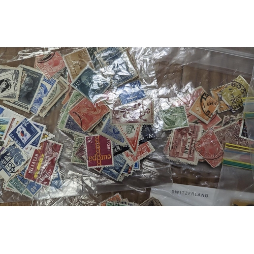 1453 - Stamp Interest - Collection of Stamps, some in an album and some loose, together with a Stanley Gibb... 