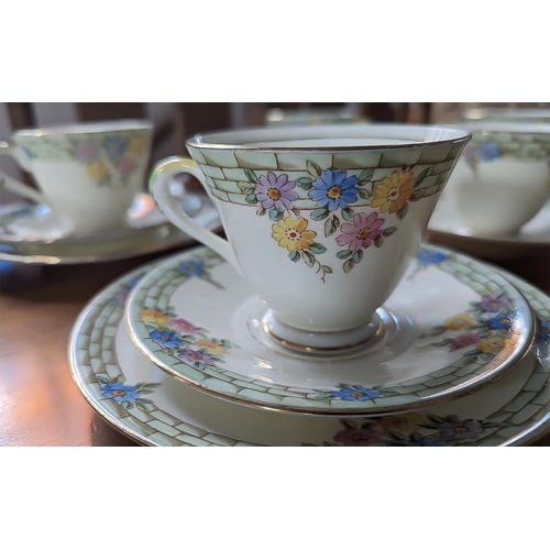 600 - Tustan China 'Plant' China Tea Set, including a cake plate, six cups, 6 saucers, five side plates, a... 