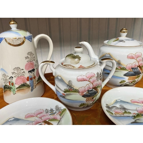 844 - Oriental Bone China Tea/Coffee Set, comprising a tea pot, coffee/hot water pot, lidded sugar bowl, m... 