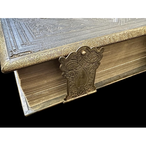 1357 - Large Victorian Family Bible, in leather embossed cover, with brass fittings. Measures 10'' x 13''.