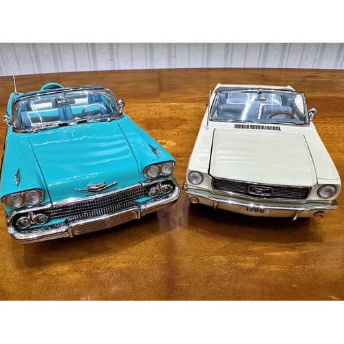 1379 - Two Danbury Mint Collector's Classic Cars, a 1958 Chevrolet Impala in turquoise, and a 1966 Ford Mus... 