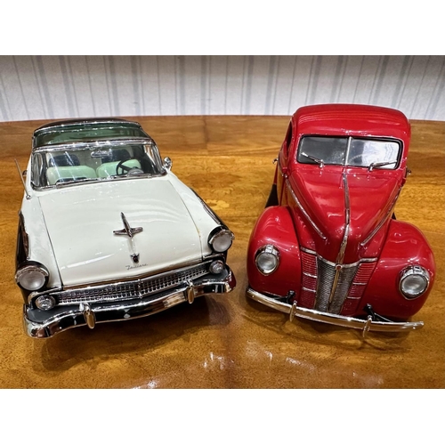 1385 - Two Danbury Mint Collector's Classic Cars, a 1940 Ford Deluxe Coupe in red, and a 1955 Ford Fairlane... 