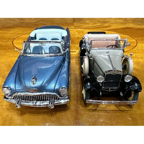 1389 - Two Danbury Mint Collector's Classic Cars, a 1931 Ford Model A Roadster in tan, and a 1953 Buick Sky... 