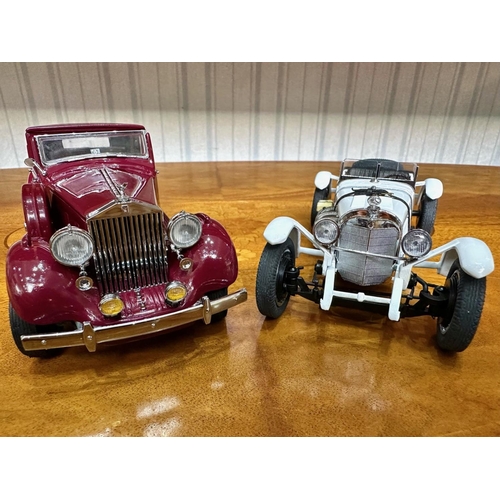 1392 - Two Danbury Mint Collector's Classic Cars, 1931 Mercedes-Benz SSKL, white, together with a 1938 Roll... 