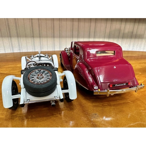 1392 - Two Danbury Mint Collector's Classic Cars, 1931 Mercedes-Benz SSKL, white, together with a 1938 Roll... 