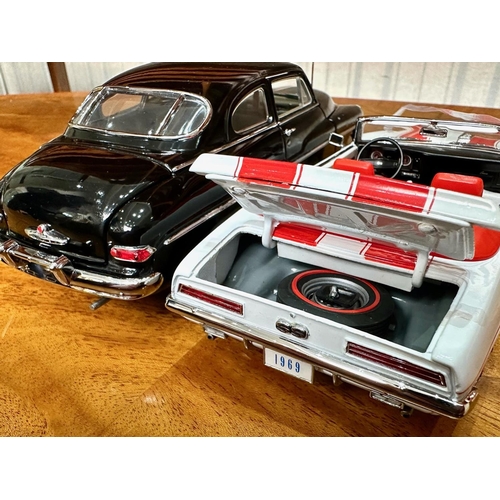 1393 - Two Danbury Mint Collector's Classic Cars, 1969 Chevrolet Camaro SS in red and white, and a 1949 Mer... 