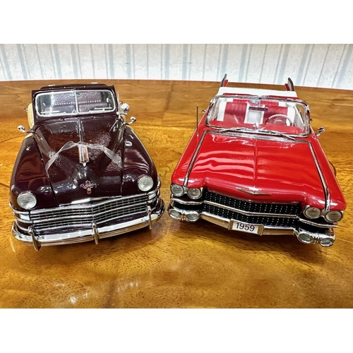 1394 - Two Danbury Mint Collector's Classic Cars,  a 1959 Cadillac Series 62 in red, and a 1948 Chrysler To... 