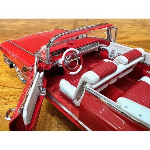 1394 - Two Danbury Mint Collector's Classic Cars,  a 1959 Cadillac Series 62 in red, and a 1948 Chrysler To... 