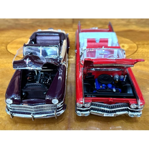 1394 - Two Danbury Mint Collector's Classic Cars,  a 1959 Cadillac Series 62 in red, and a 1948 Chrysler To... 