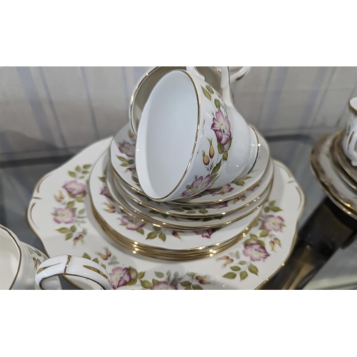 1434 - Collection of Bone China, including tea cups, saucers, bread and butter plates, side plates, milk ju... 