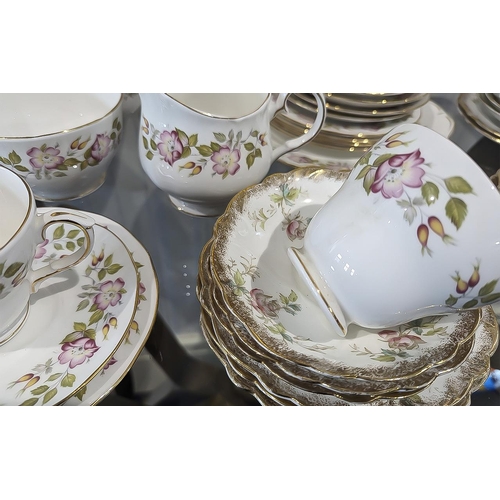 1434 - Collection of Bone China, including tea cups, saucers, bread and butter plates, side plates, milk ju... 