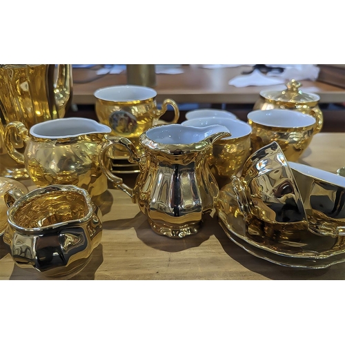 1437 - Vintage Czechoslovakian Gilt Porcelain Tea Service 'Bernadette', including tea pot, coffee pot, hot ... 