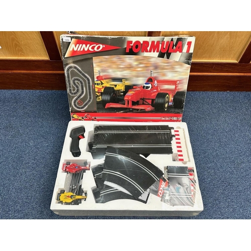 1450 - Ninco Formula 1 Slot Racing Set, Reference Number 20106. An as new unopened set in worn box.