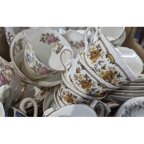 1542 - Large Collection of Assorted Porcelain, including tea and coffee cups, saucers, milk jugs and sugar ... 