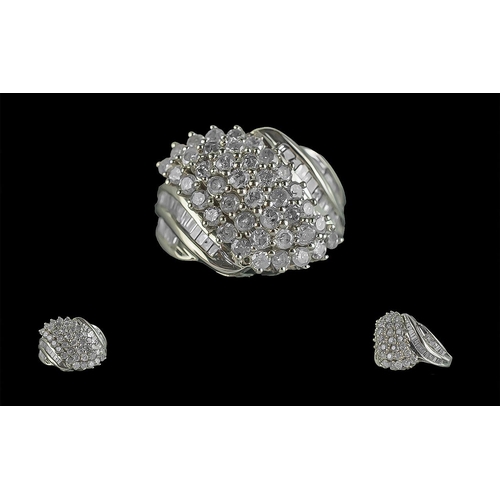 281 - 9ct White Gold Cluster Ring Set with Round Brilliant Cut and Baguette-cut diamonds totalling 2.04 ct... 