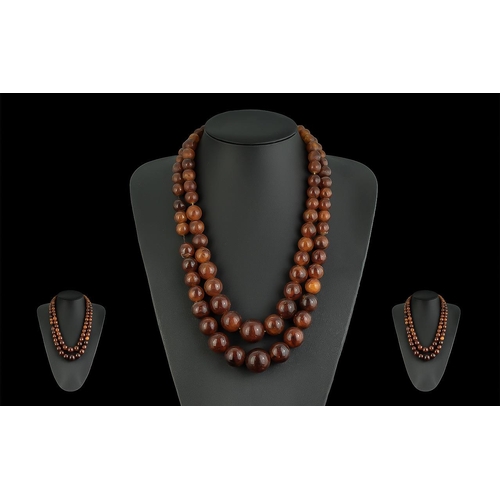 284 - Amber Necklace, twin strands, dark butterscotch colour.