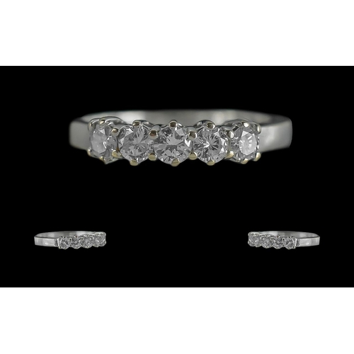 302 - 18ct White Gold Attractive Five Stone Diamond Set Ring, full hallmark to interior of shank; the five... 