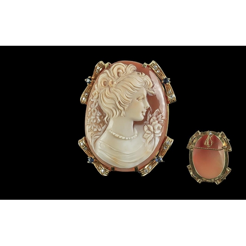 308 - A Fine Quality 18ct Gold and Diamond / Sapphire Mount Set Shell Cameo Brooch - Pendant. Marked 750 w... 