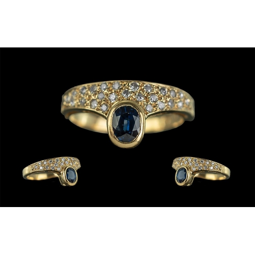 31 - 18ct Gold Attractive Diamond and Sapphire Set Dress Ring, marked 18ct to interior of shank, the face... 