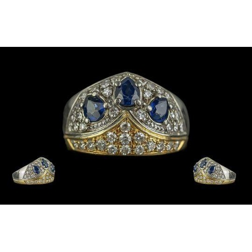 313 - Diamond & Sapphire Dress Ring, fully hallmarked, three pear shaped Sapphires surrounded by 40 pave s... 