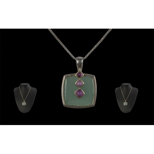 317 - Attractive Oriental Silver Pendant, square form with jade green centre stone and three pale amethyst... 