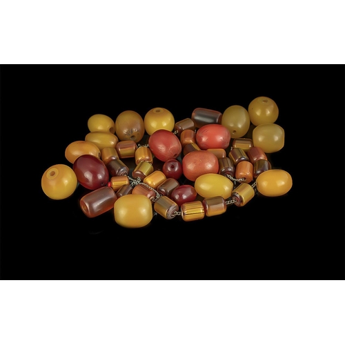 319A - Collection of Amber Coloured Beads, various shapes and sizes, some loose, one necklace.  Gross weigh... 