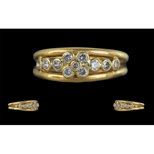 35 - 18ct Gold Attractive Diamond Set Ring with openwork setting,  marked 18ct to the shank, the round, f... 