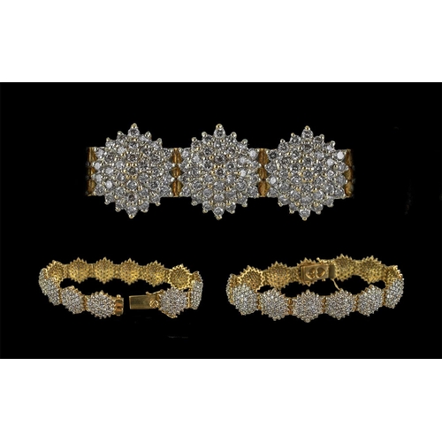 43 - Ladies Contemporary 18ct Gold Pleasing Diamond Set ( Cluster Design ) Bracelet, Marked 18ct. Consist... 