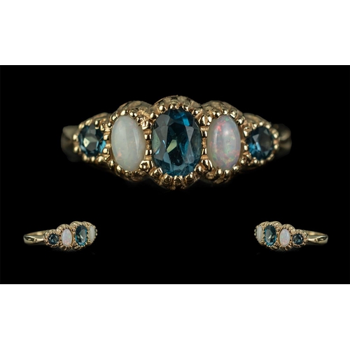 54 - Ladies 9ct Gold Attractive and Pleasing Design Five Stone Opal and Blue Topaz Set Ring, with full ha... 