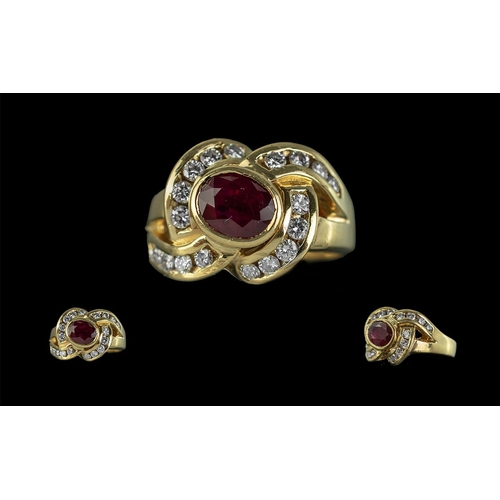 55 - 18ct Yellow Gold Designer Diamond and Ruby Set Dress Ring, marked 18ct to shank, the centre ruby sur... 