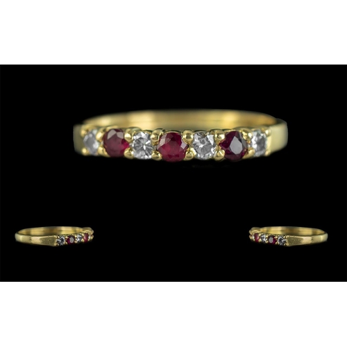 56 - Ladies 18ct Gold Attractive Ruby and Diamond Set Ring, with full hallmark to shank, both rubies and ... 