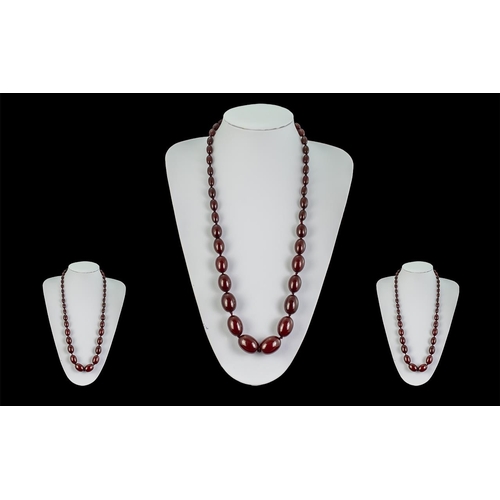 61 - 1920s Excellent Quality Cherry Amber Beaded Necklace of Good Colour, weight 67.9g, length 28 inches ... 