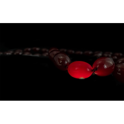 61 - 1920s Excellent Quality Cherry Amber Beaded Necklace of Good Colour, weight 67.9g, length 28 inches ... 