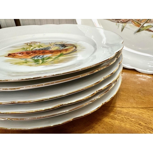 638 - German Bavarian Porcelain Decorated with Fish, comprising six 9.5'' dinner plates, an oval 14'' serv... 