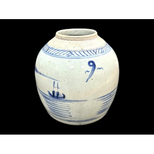 852 - Antique Chinese Glazed Jar, blue design of fisherman and houses, measures 7'' tall.