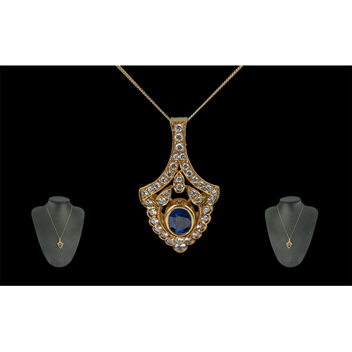 36 - A Superb 18ct Gold Attractive Diamond and Sapphire Set Pendant Drop - Attached to a 18ct Gold Chain.... 